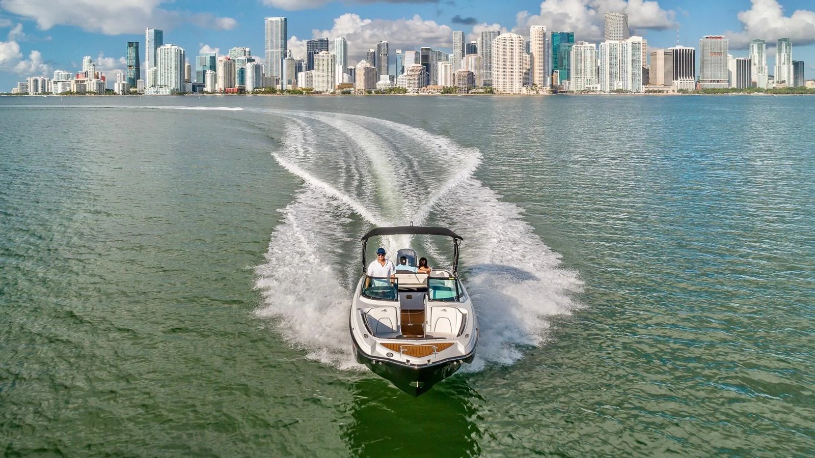 27' Monterey M-65 with Miami in the background